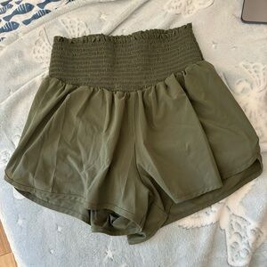 Green athletic shorts